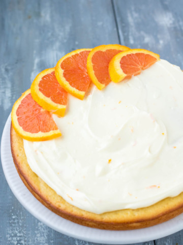Orange_Cake_Spring_PiperCooks Use Cara Cara Oranges in this spring layer cake with fresh orange juice, orange zest and Orange Cream Cheese Icing.
