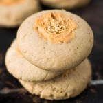 Stacked cookies with melted butterscotch chip topping.