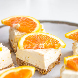 squares of orange creamsicle cheesecake dessert bar