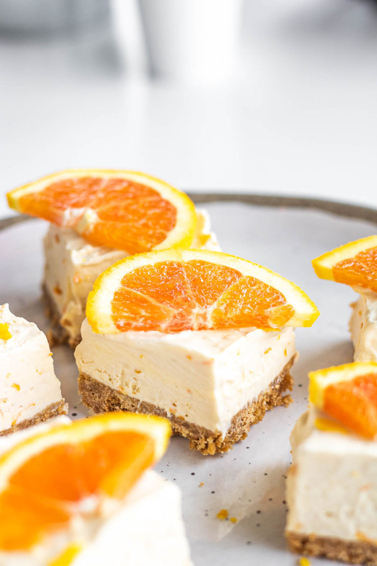 squares of orange creamsicle cheesecake dessert bar