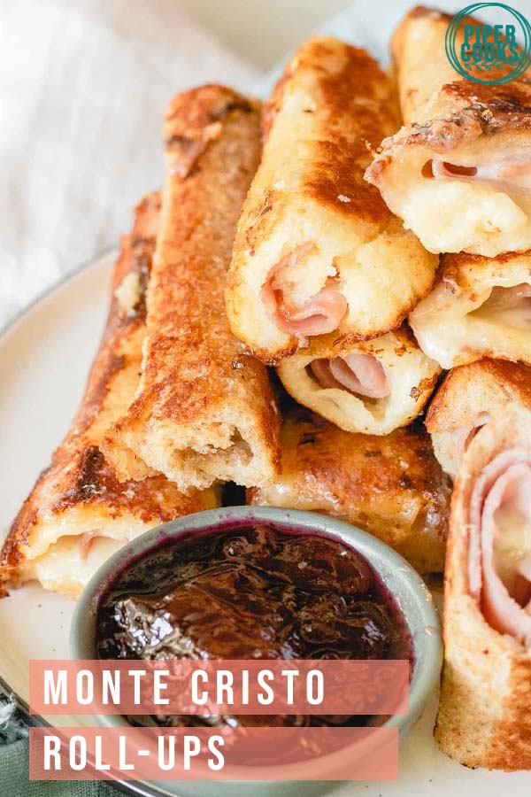 Monte Cristo Roll-Ups on a plate with jam and with text overlay for pinterest