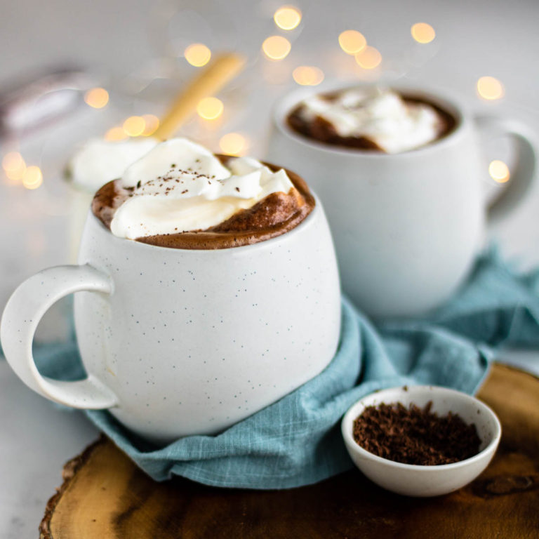 Peppermint Hot Chocolate in a mug with whipped cream on top