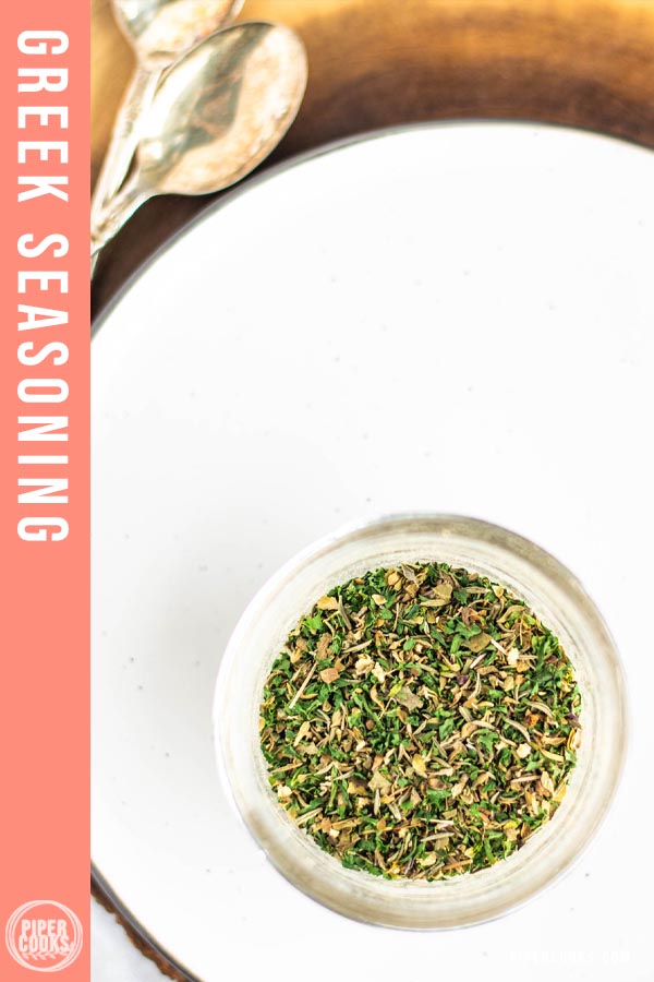 greek seasoning in a jar with text overlay for pinterest
