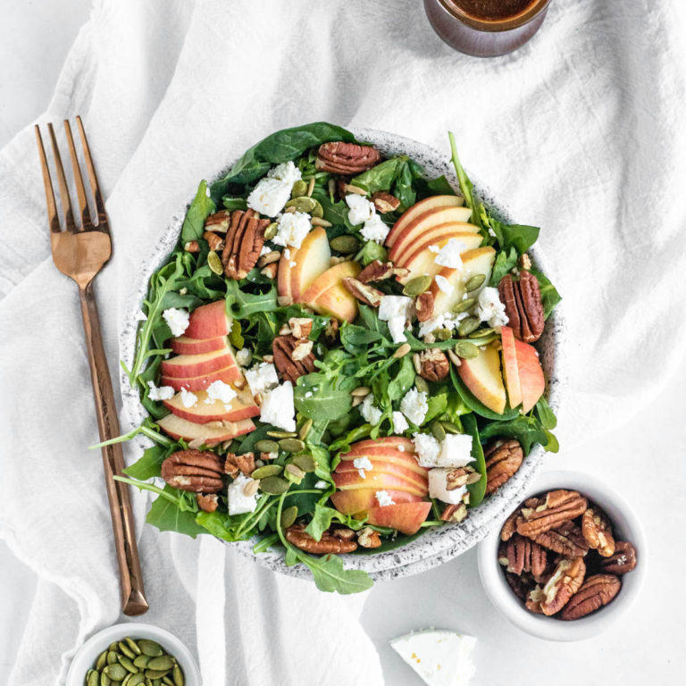 Spinach Salad with Apples in a bowl
