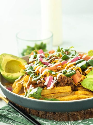 loaded taco fries on a plate