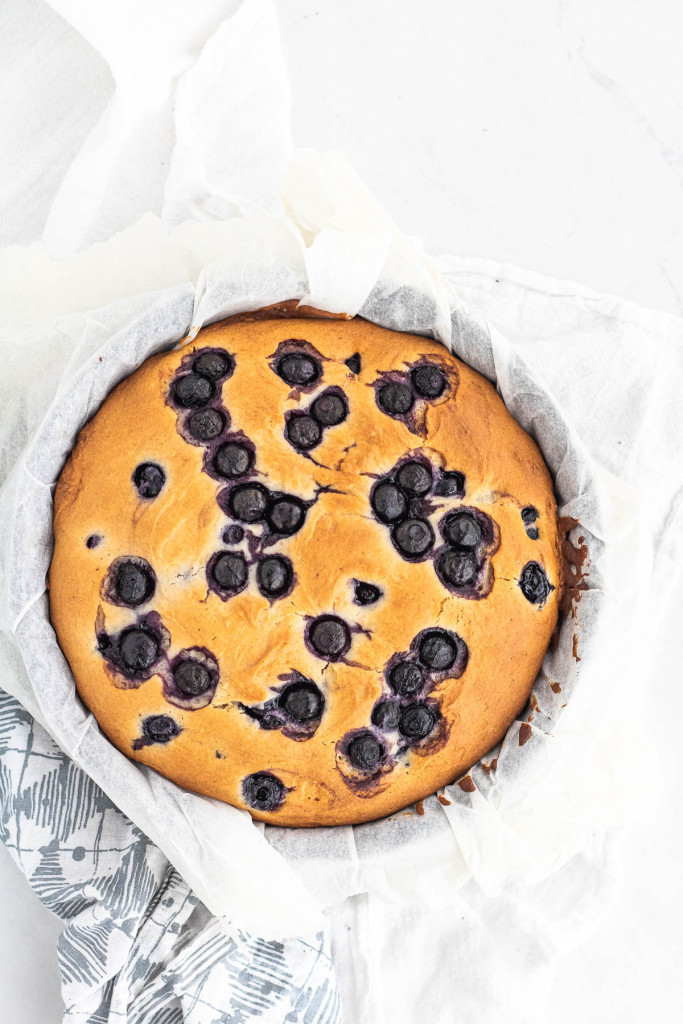 Vanilla Blueberry Cake on parchment paper