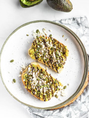 smashed avocado on toast on a plate