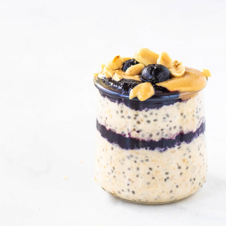 peanut butter and jelly overnight oats in a jar