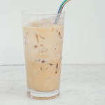 iced coffee in a glass with a straw