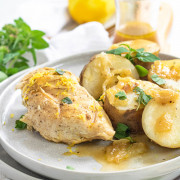 cooked chicken and potatoes on a plate