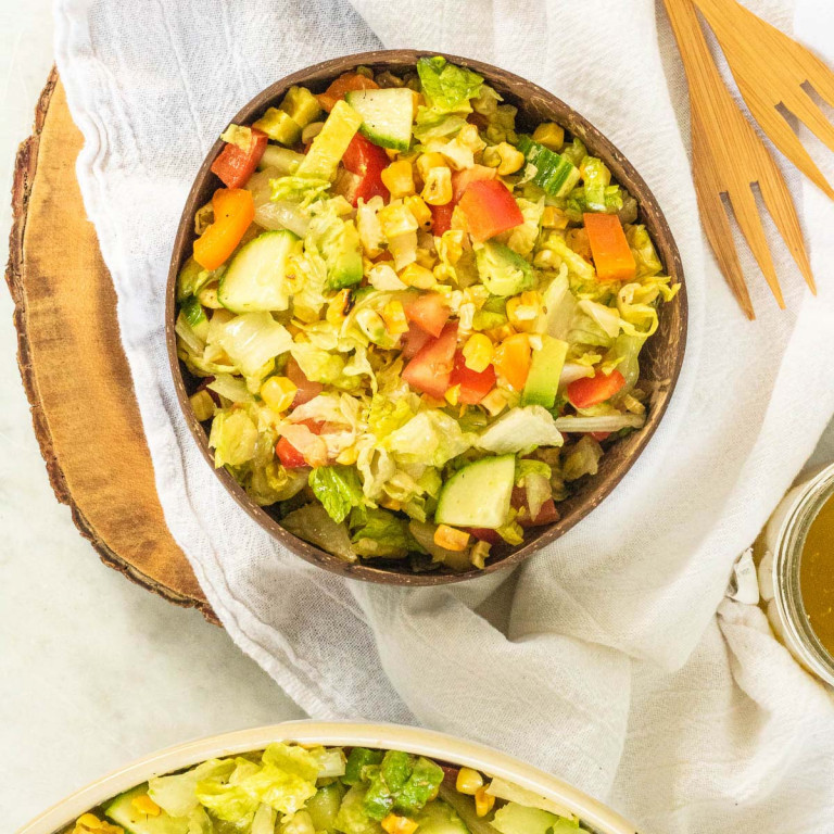 chopped corn salad in bowls