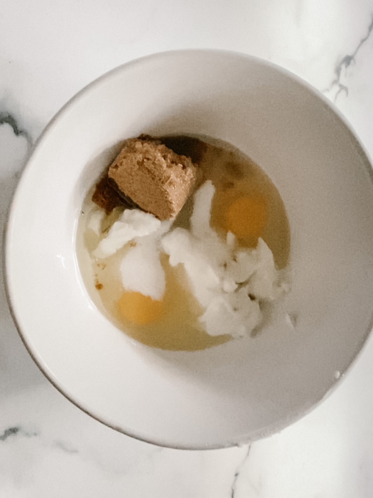eggs, yogurt and sugar in a mixing bowl