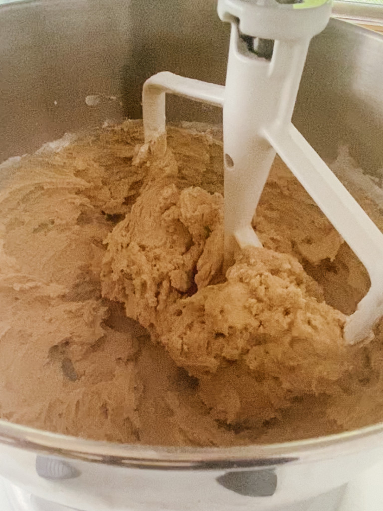 mixing chocolate chip cookies in a mixer