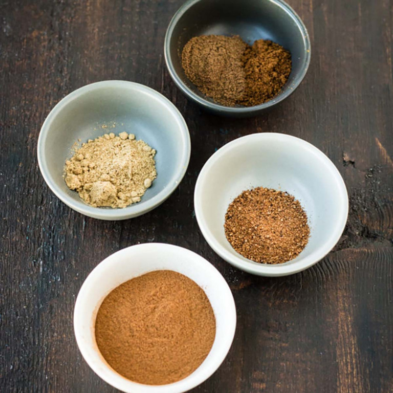 Pumpkin pie spices in bowls