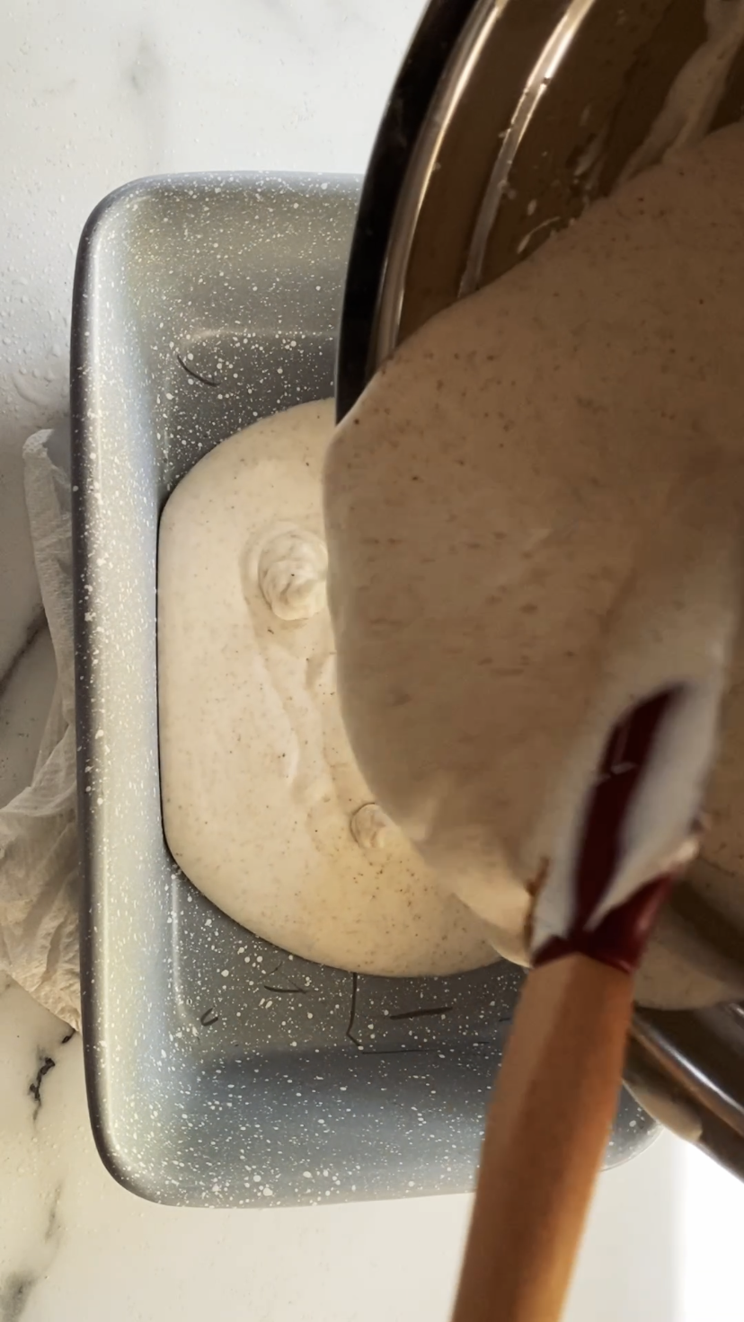 pouring ice cream mix in bread loaf pan