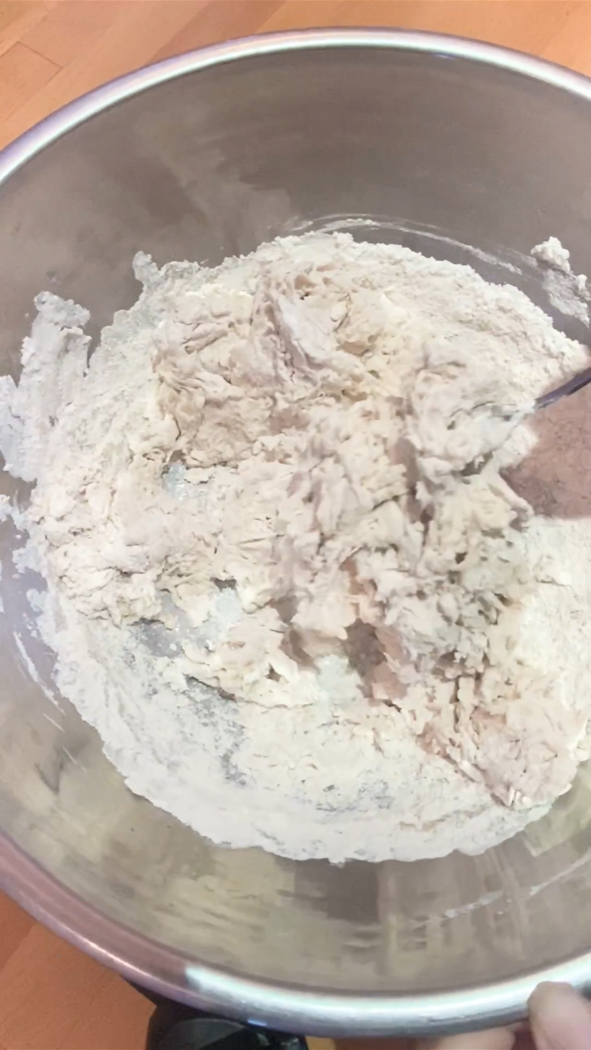 shaggy dough in a bowl for focaccia bread