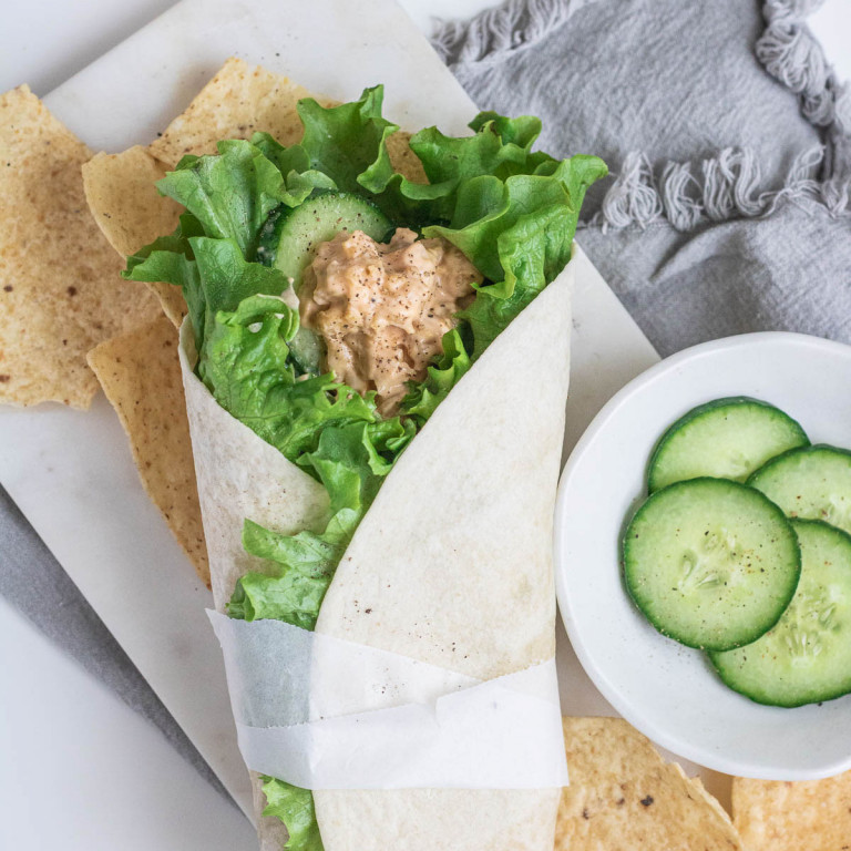 chickpea sandwich spread and lettuce in a wrap.