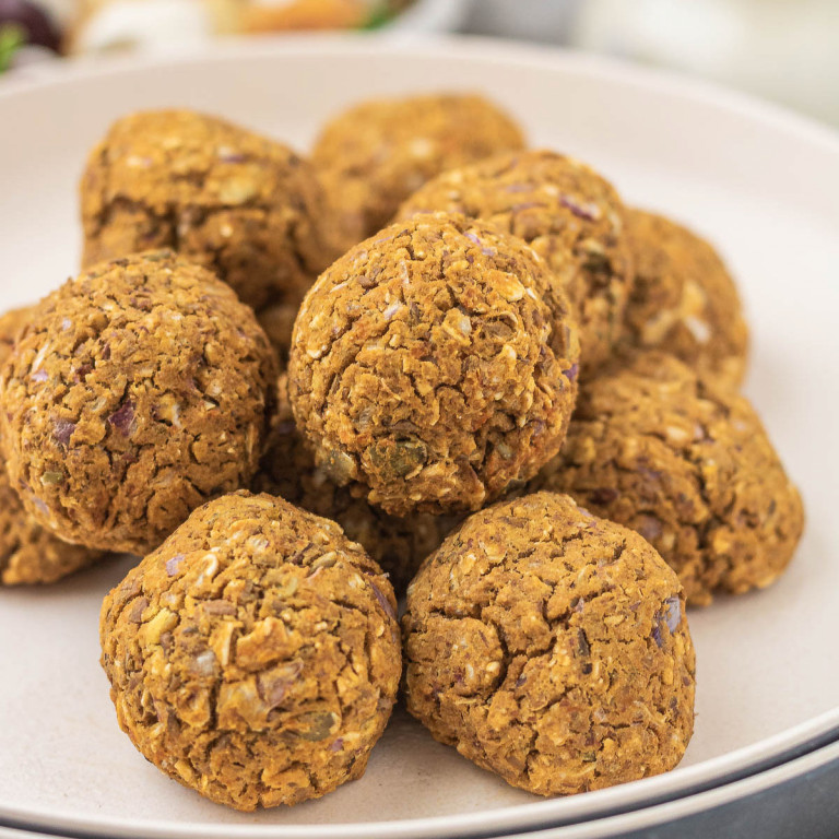 Veggie balls on a plate.