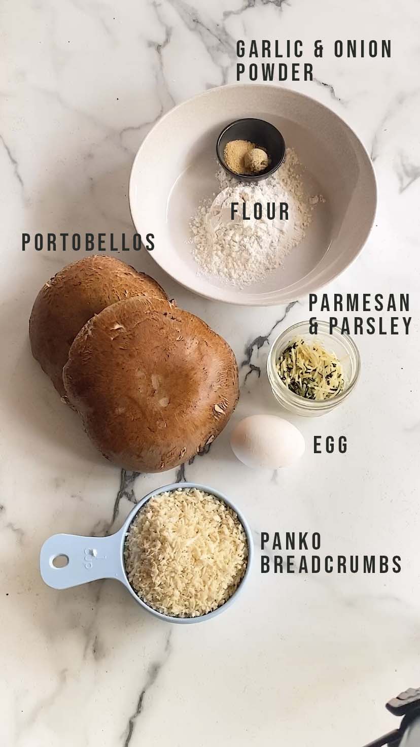 Ingredients for portobello fries on a white marble counter.