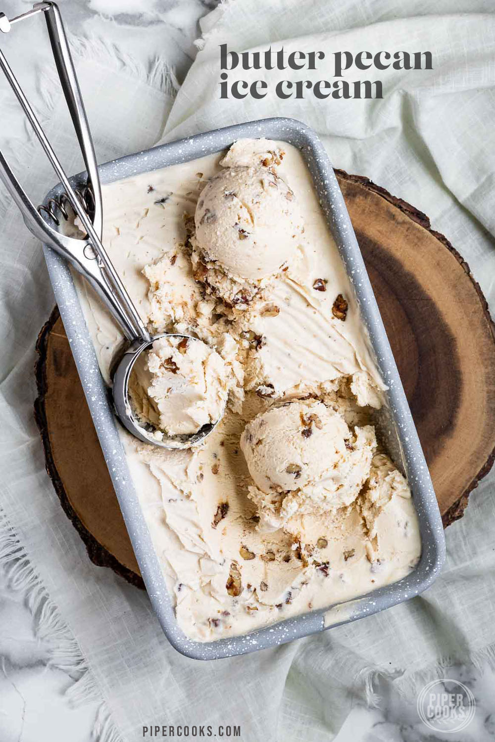 Butter pecan ice with chopped pecans in it in a bowl with a text title for Pinterest.