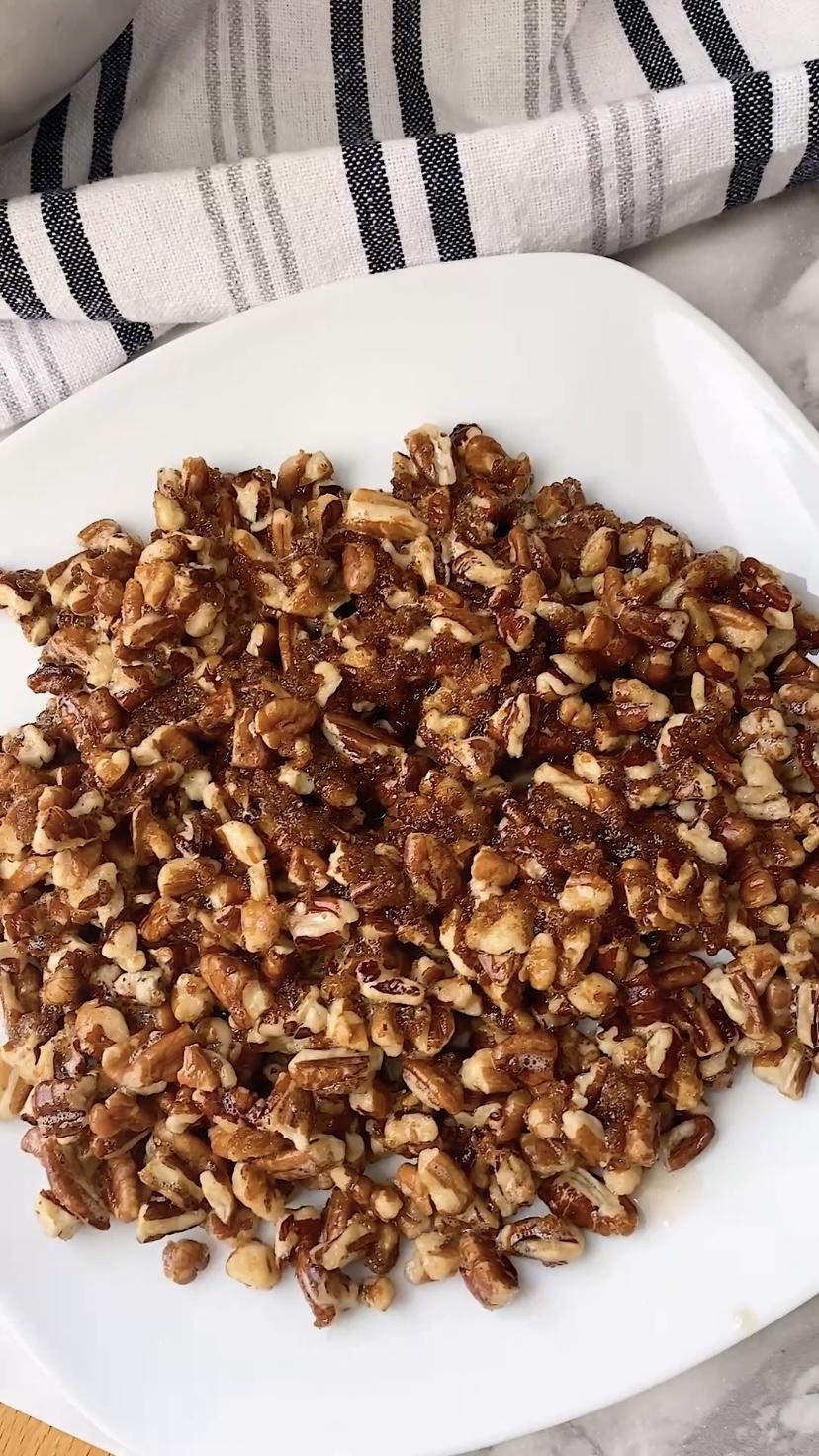 Candied pecans on a plate.