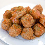 Buffalo turkey meatballs on a plate.