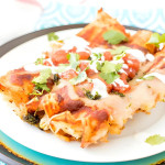 Enchiladas on a plate.