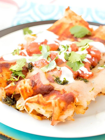 Enchiladas on a plate.