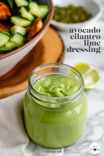 Green salad dressing in a jar with text for Pinterest.