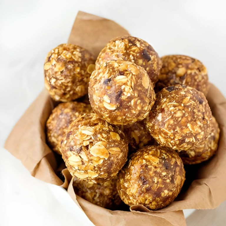 Round protein balls made with oats in a bowl.