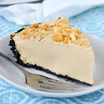 A slice of peanut butter pie on a plate.