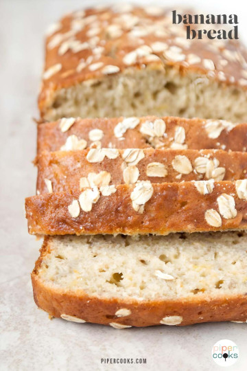 Sliced banana bread with oats on top and text for Pinterest.