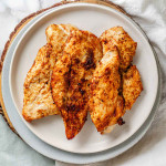 Cooked chicken on a plate.