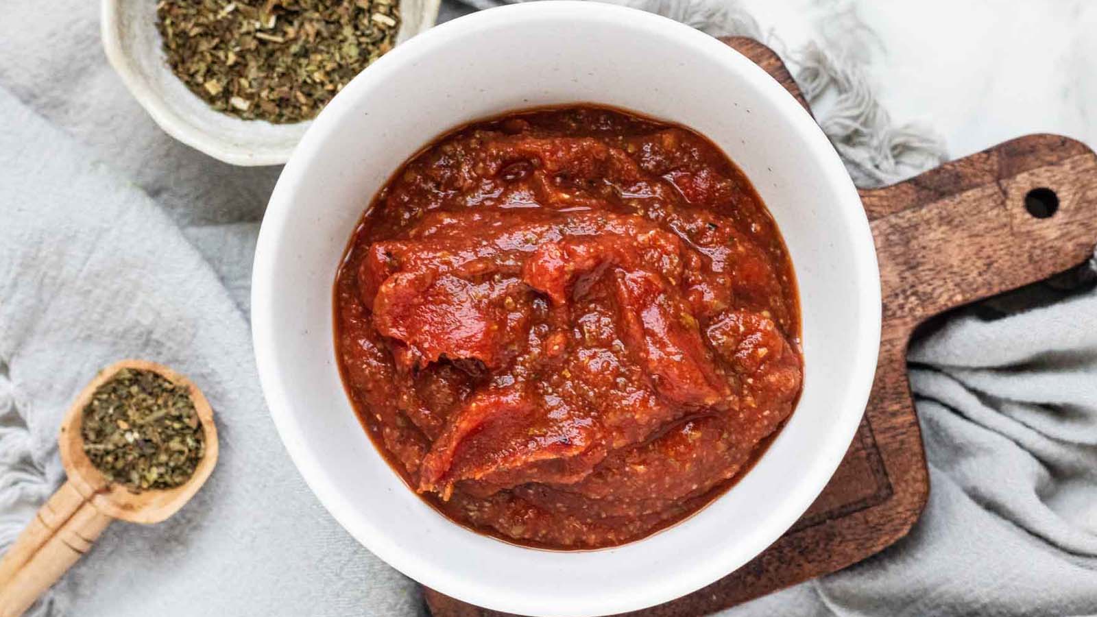 Pizza sauce in a bowl.