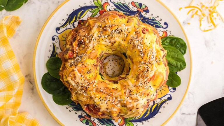 A circle breakfast bake on a plate.