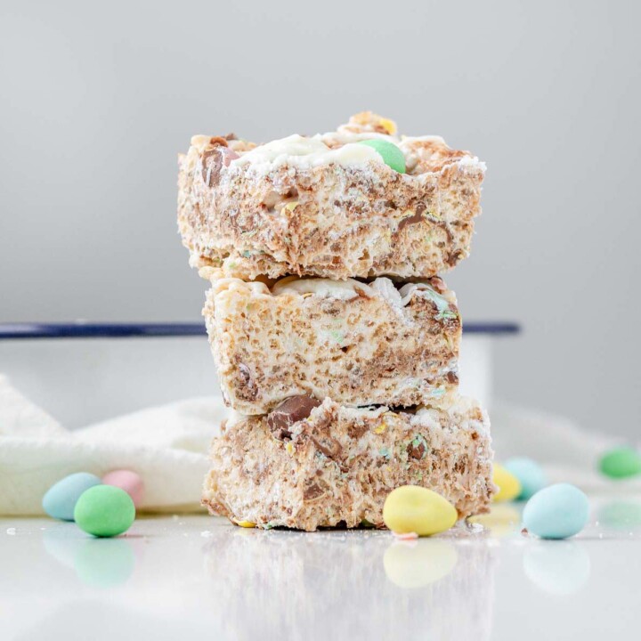 Stacked rice krispies squares with mini eggs.