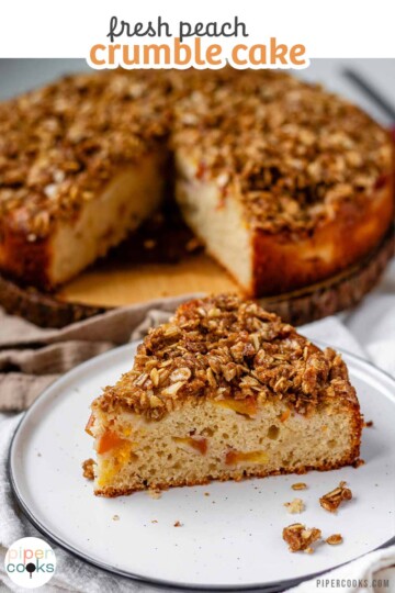 Cake with peaches inside and crumbled oats on top with the text fresh peach crumble cake.