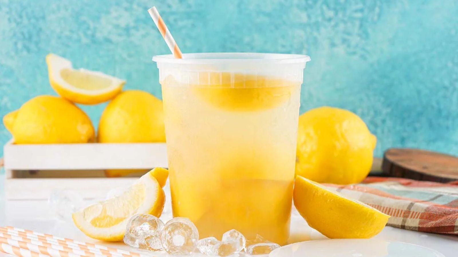 Lemonade in a glass with ice,