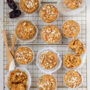 Muffins on a wire rack with the text zucchini carrot muffins.