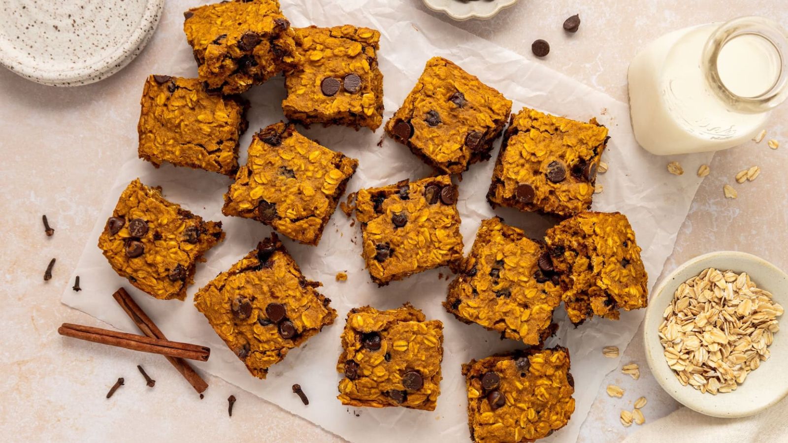 Squares of dessert bar topped with chocolate chips.