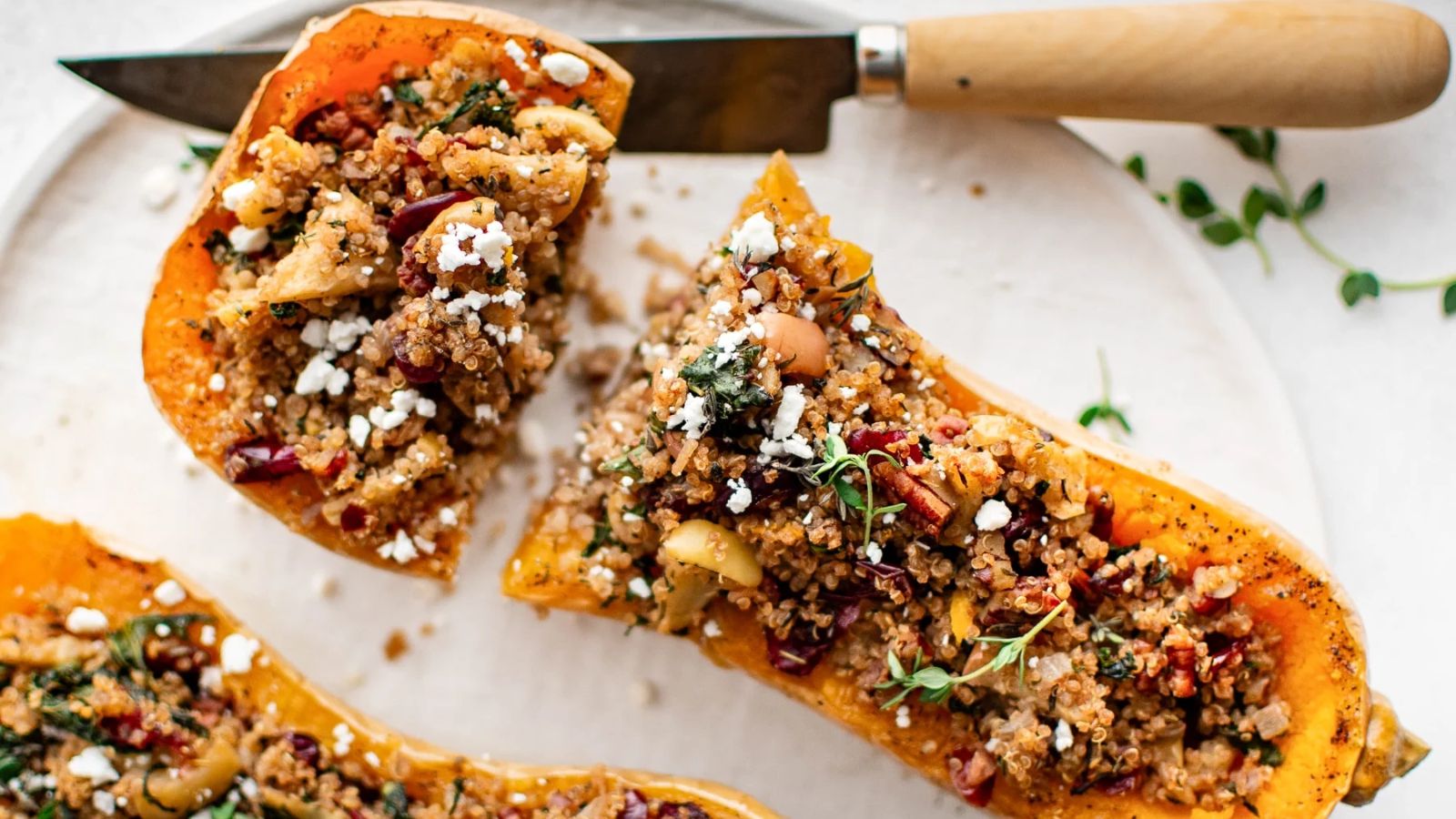 A stuffed, halved butternut squash.