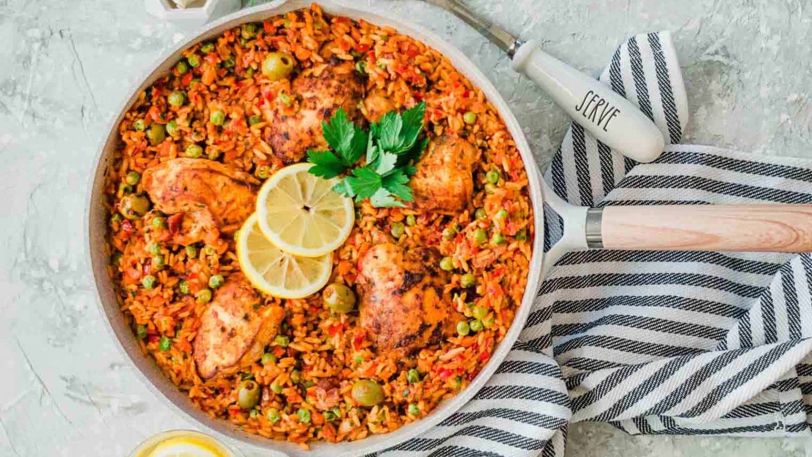 Rice and chicken in a skillet.