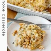 Baked rice and artichoke casserole topped with melted Havarti and Parmesan cheese in a white dish and a plate with the text artichoke casserole.