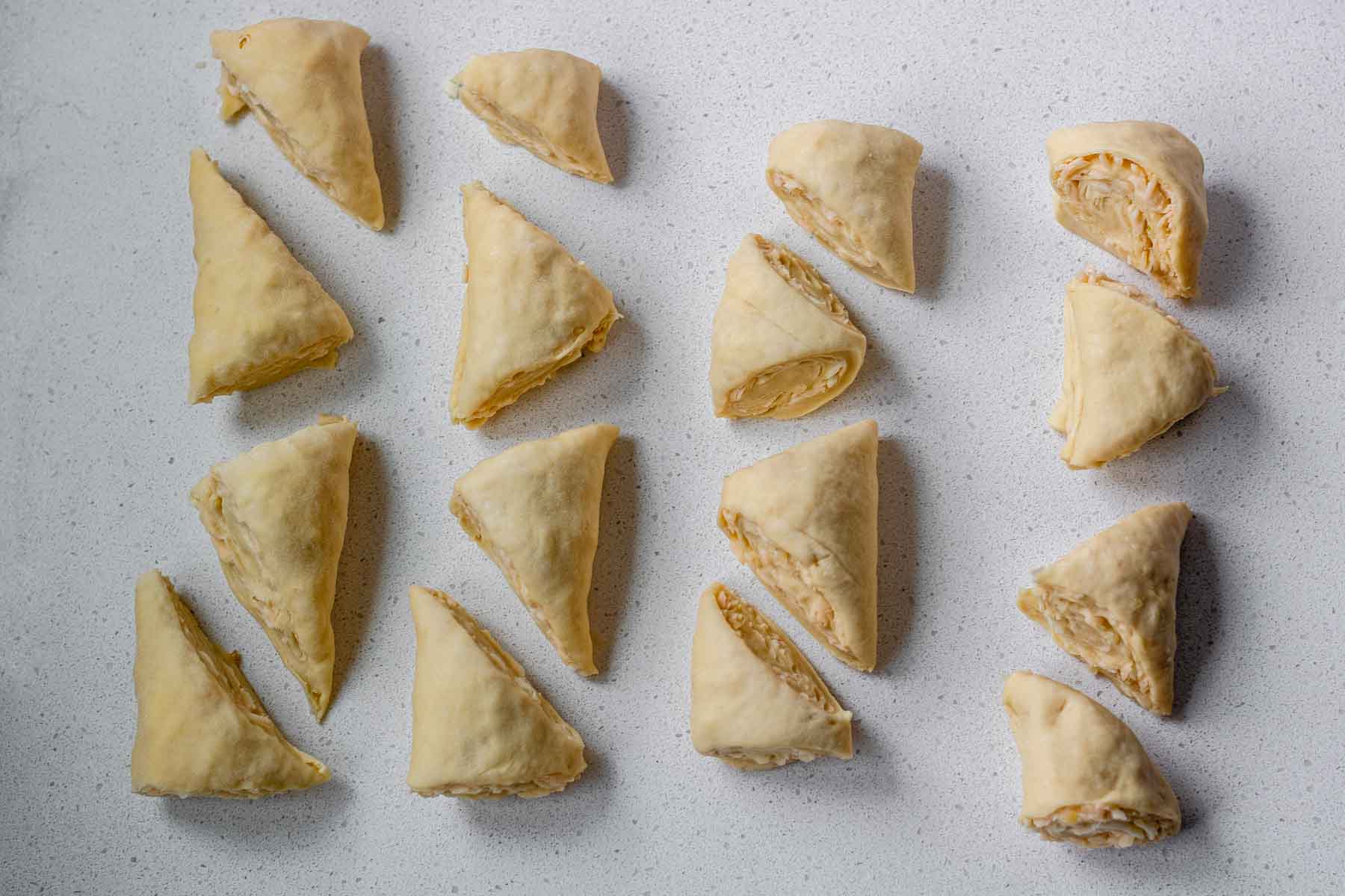 16 rectangles of rolled, layered dough.