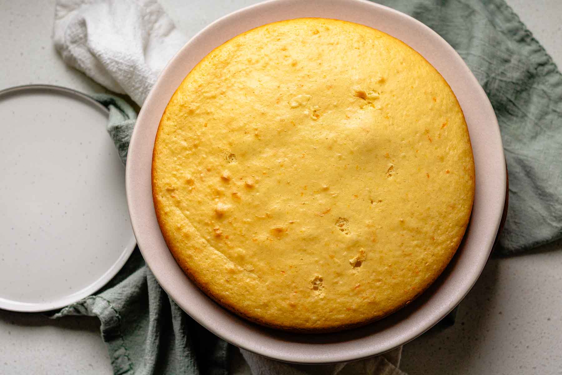 A cake layer on a plate.