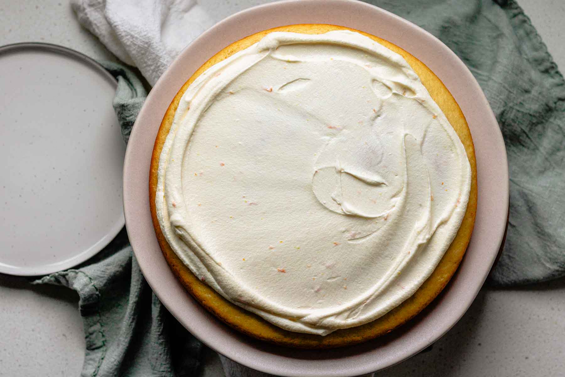 A cake with icing on top.