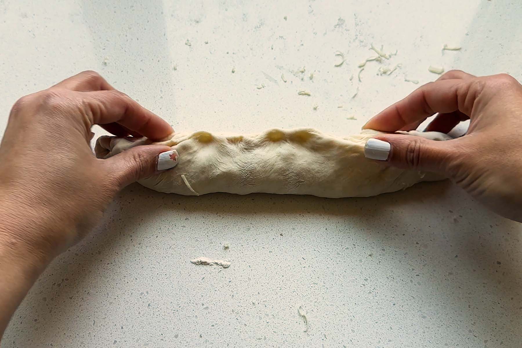Dough pinched and sealed.