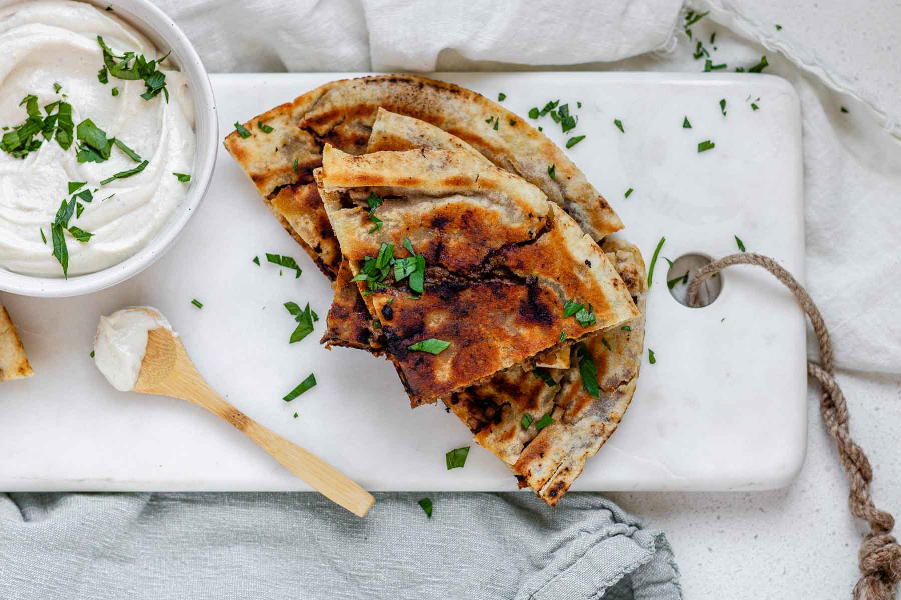 Meat-filled fried pitas.