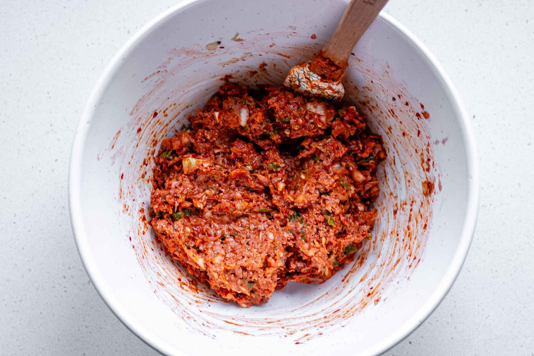 A bowl with meat mixture.