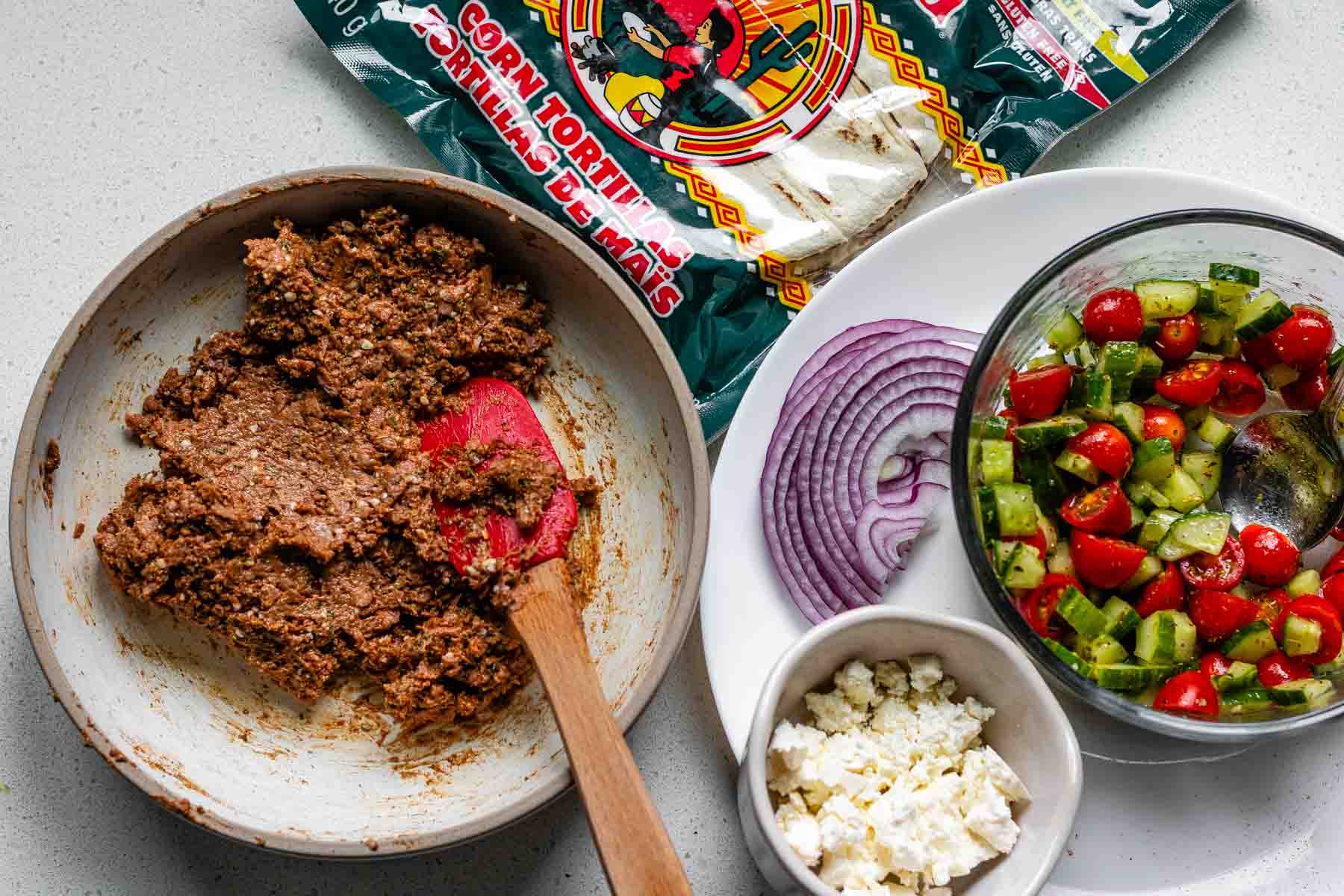 Bowls with ingredients for tacos.